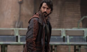 Cassian Andor looks behind him while he walks in Andor season 1.