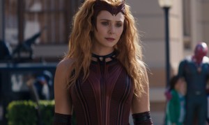 Elizabeth Olsen stands in a Westview town square in WandaVision.