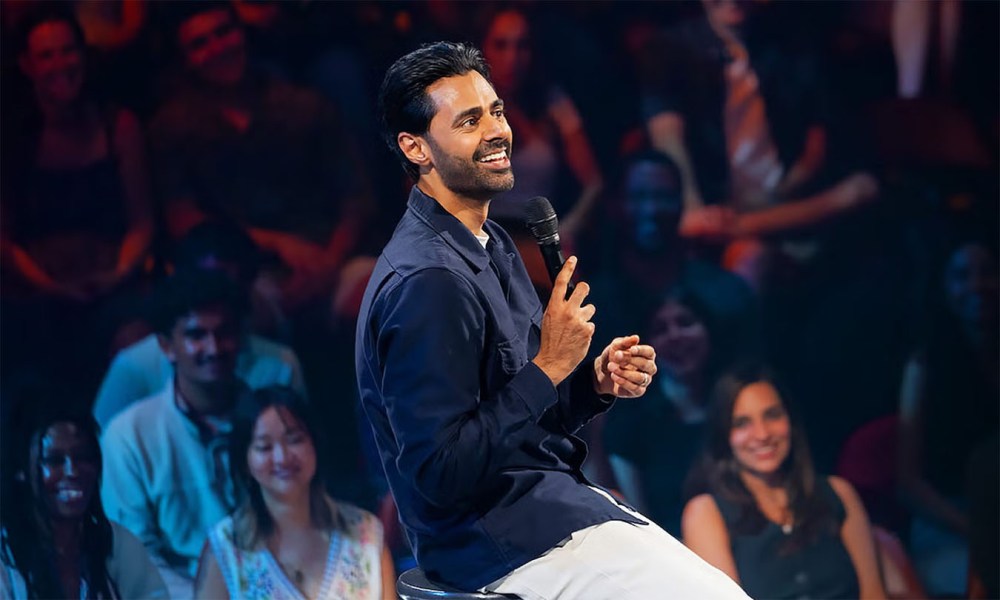 Hasan Minhaj performing at his Off With His Head special.