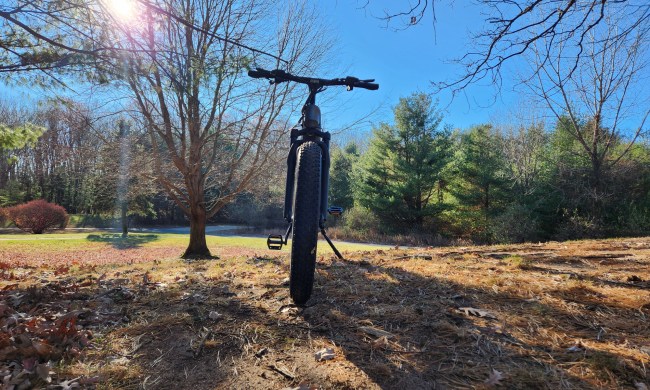 HeyBike Hero e-bike direct frontal view from below a rise emphasizing the large front tire.