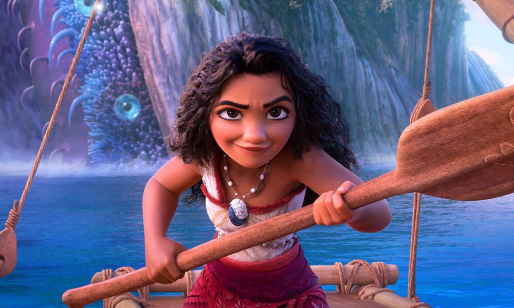 Moana rows with confidence in a scene from Moana 2.