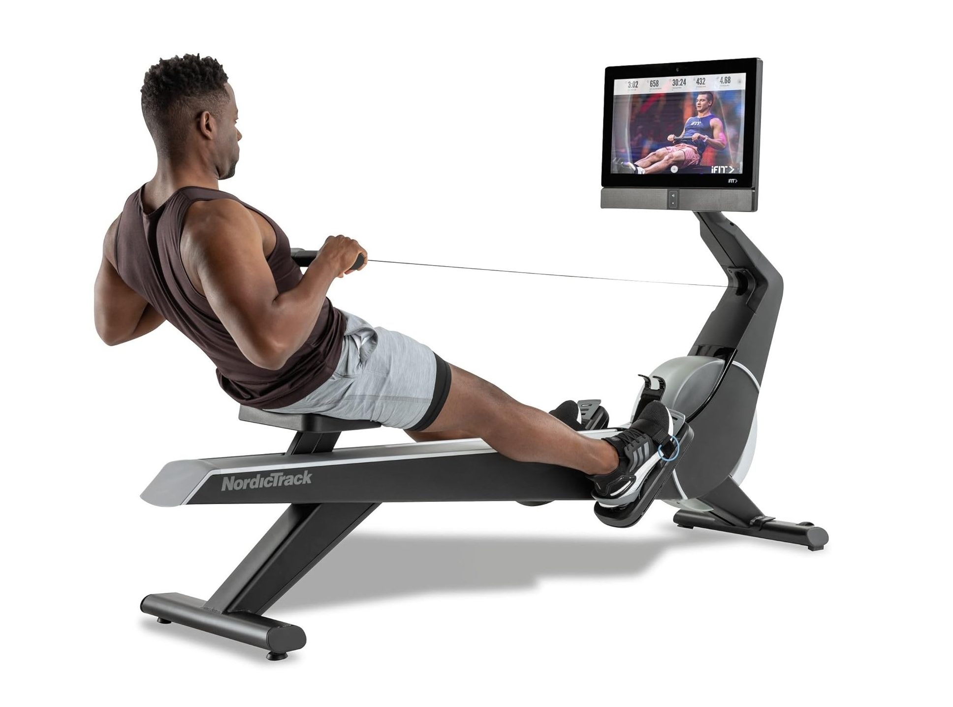 A man working out on the NordicTrack Smart Rower.