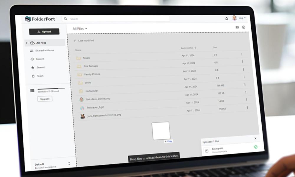 Someone using FolderFort cloud storage on laptop
