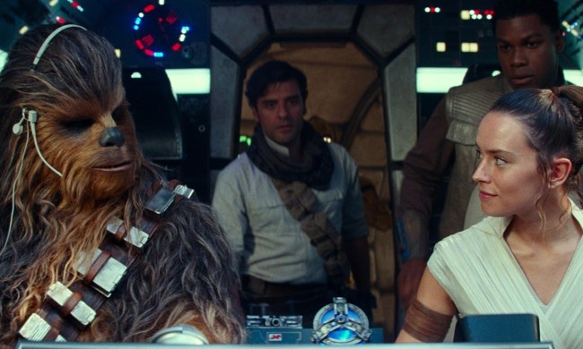 Three people and one wookie sti in a spaceship.