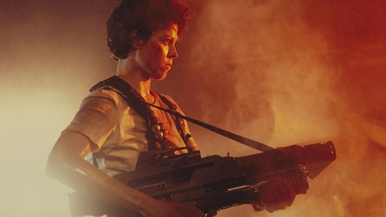 Ripley holds her gun in Aliens.