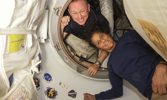 NASA’s Boeing Crew Flight Test astronauts (from top) Butch Wilmore and Suni Williams inside the vestibule between the forward port on the International Space Station’s Harmony module and the Starliner spacecraft.