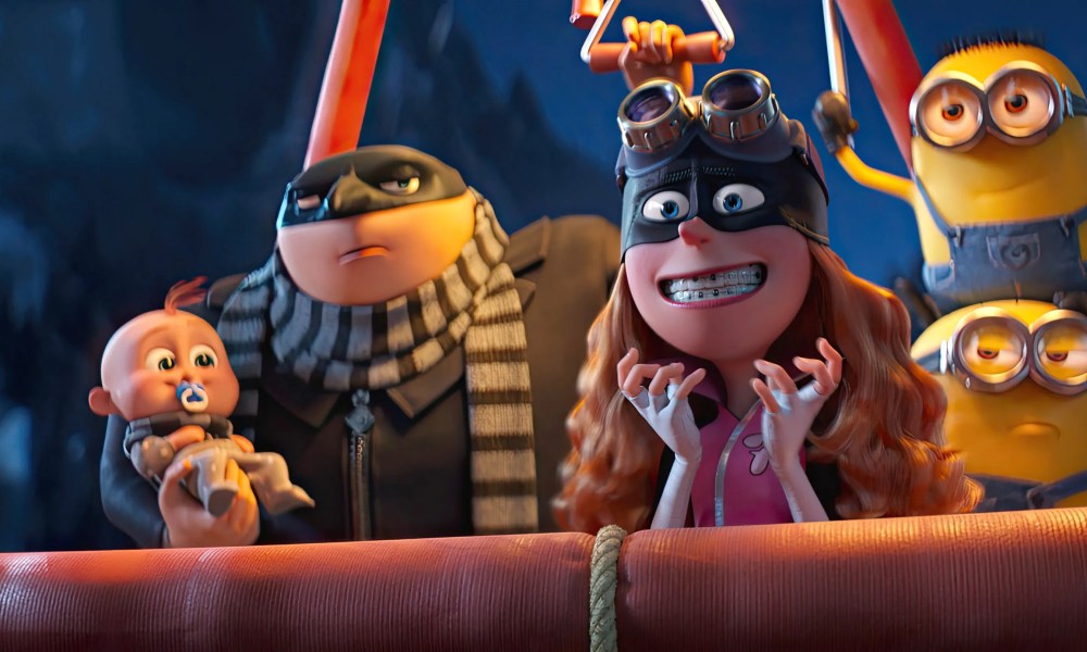 The Gru family and two minions on a roller coaster.