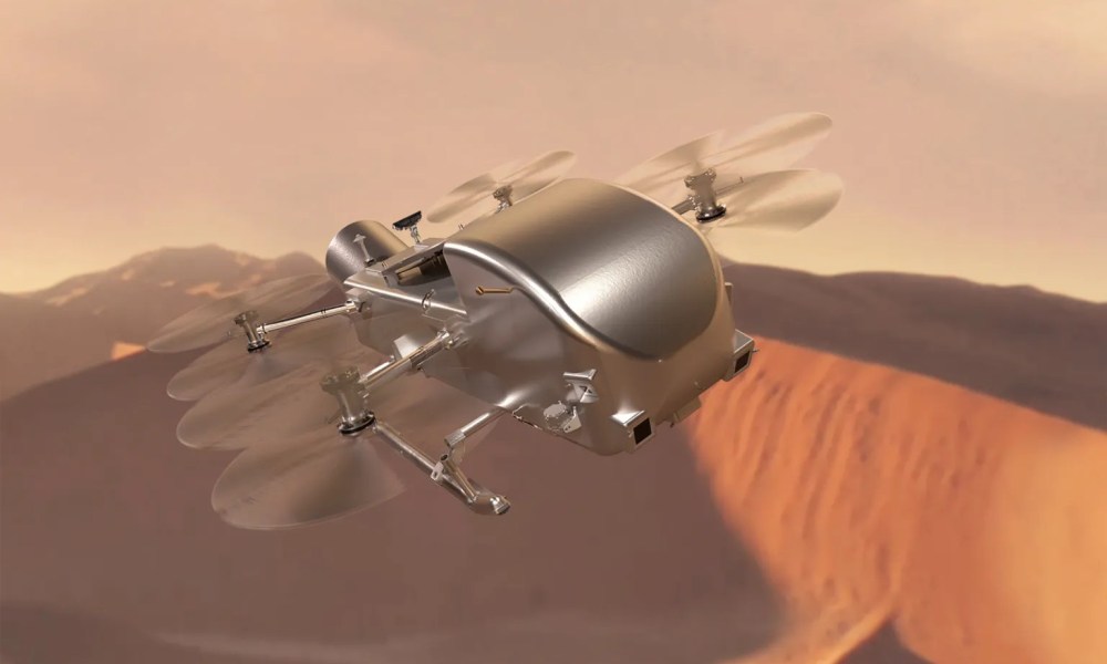 Caption: Artist’s concept of Dragonfly soaring over the dunes of Saturn’s moon Titan.