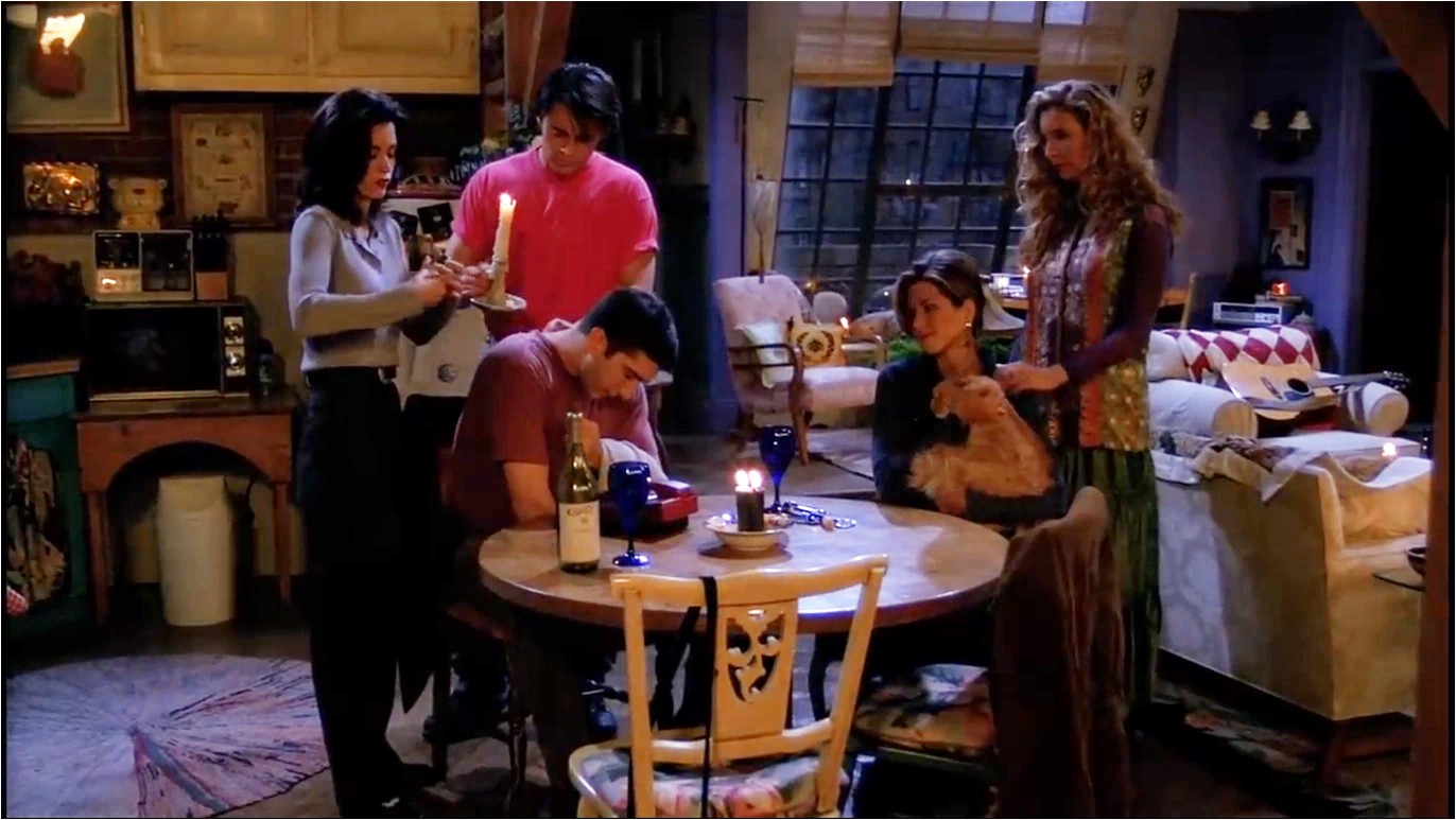 5 amis allument des bougies dans Friends.