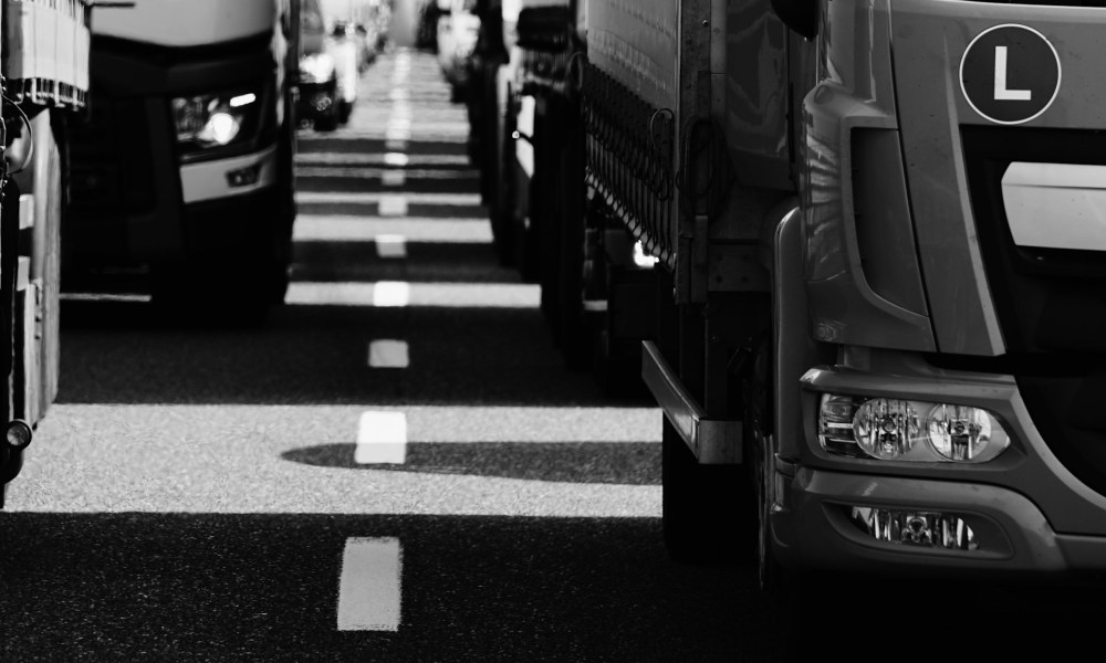 greyscale-photo-of-buses-by-wolfgang-hasselmann-unsplash