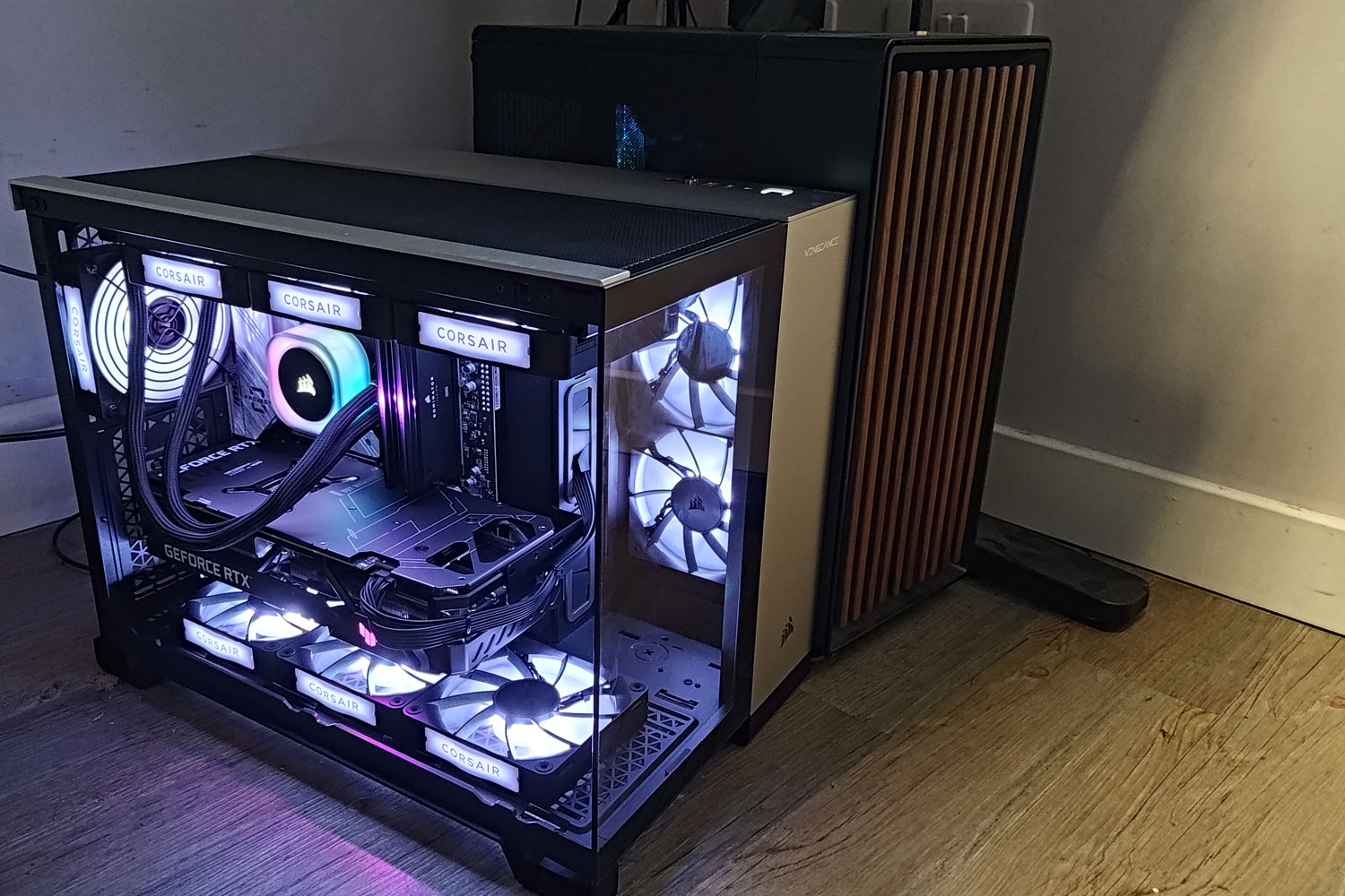 Corsair Vengeance PC next to a custom gaming PC.