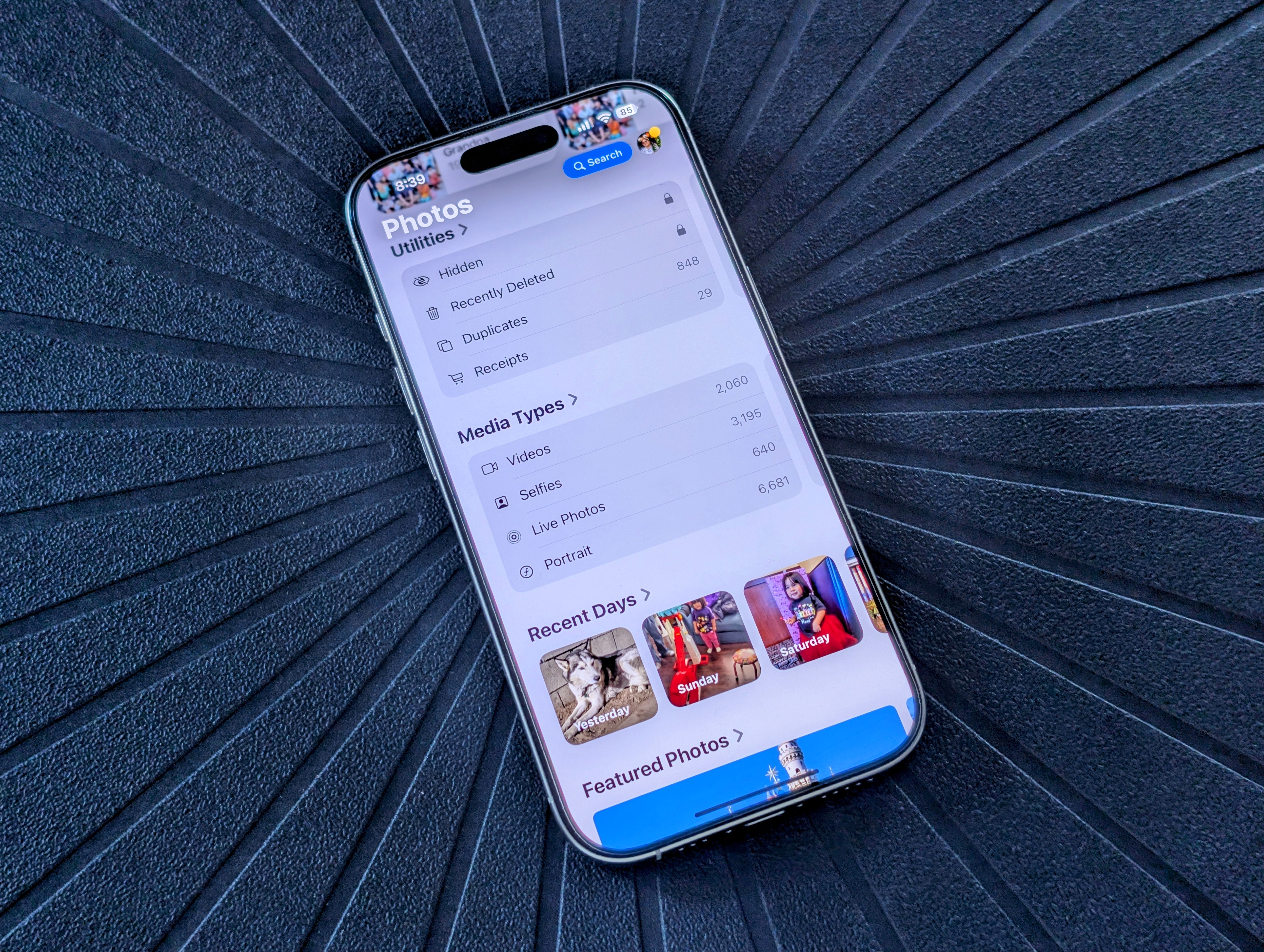 Viewing various sections in the Photos app on iOS 18.