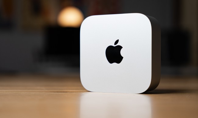 The Mac mini up on its side on a desk.