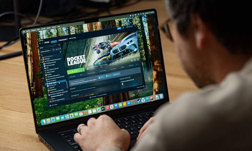 A person running Steam on the M4 MacBook Pro. Rocket League is up on the screen