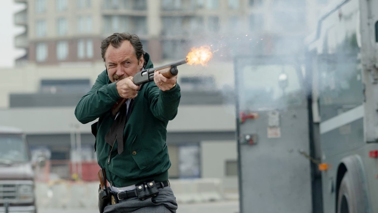 A man fires a gun in The Order.