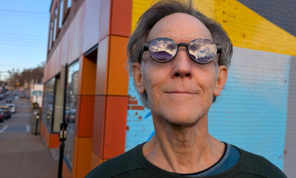 Alan Truly wears the lightweight and stylish Even G1 smart glasses.