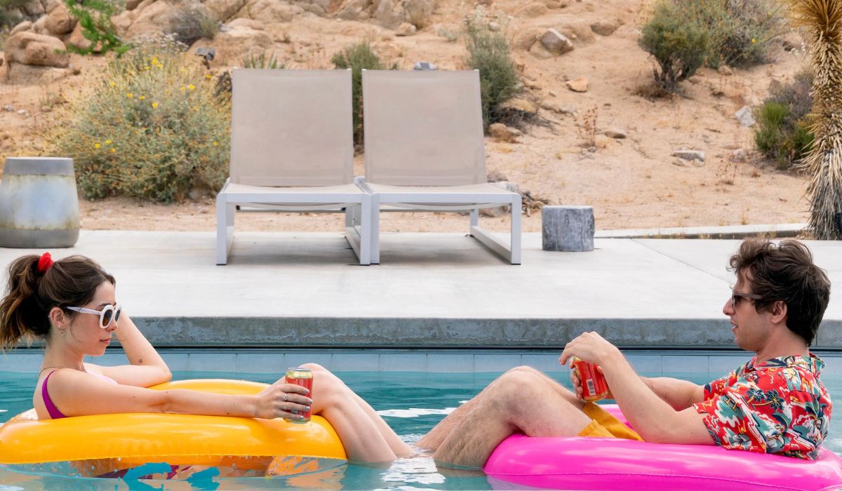 Andy Samberg sits in a pool in Palm Springs