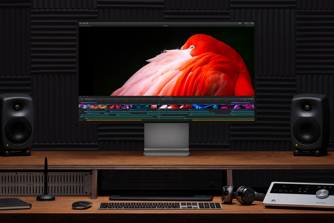 The Apple Pro Display XDR monitor on a desk.