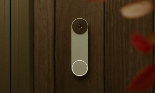 Google Nest doorbell outside a home wall.