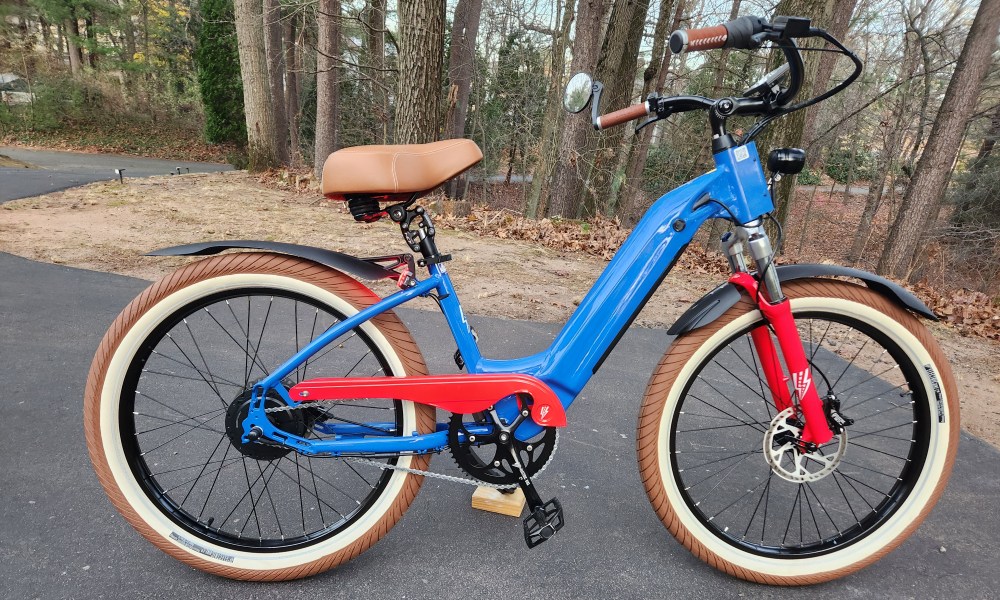 Electric Bike Company Model R right profile view parked in a driveway.