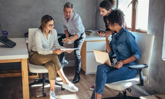 A group of coworkers using LastPass Teams.