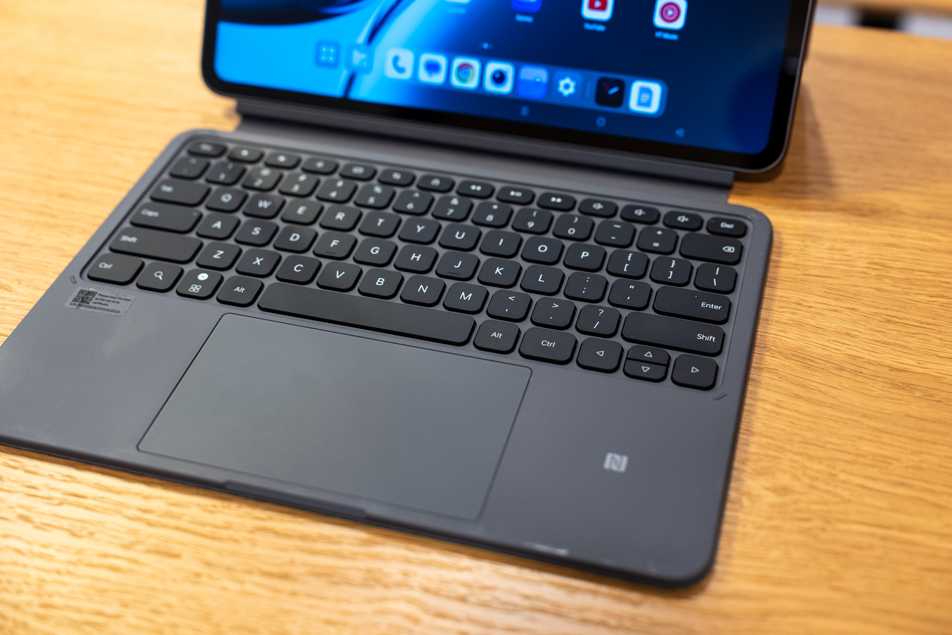 The OnePlus Pad 2 smart keyboard and trackpad while attached to the tablet