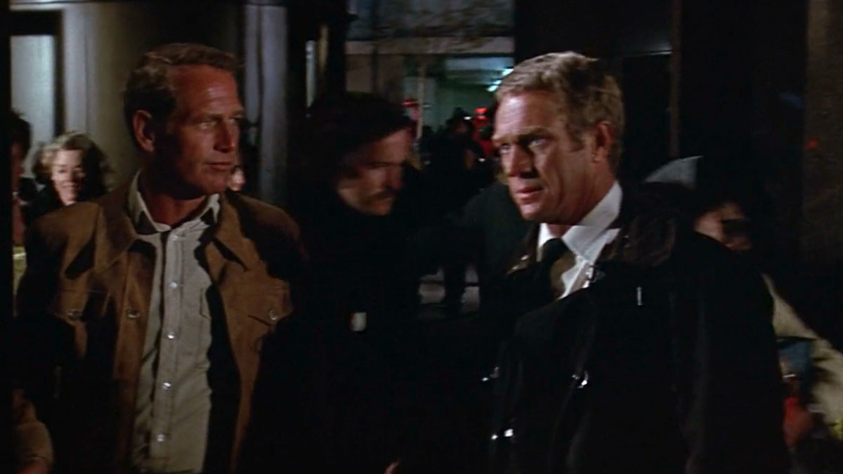 Paul Newman und Steve McQueen stehen sich in „The Towering Inferno“ gegenüber.