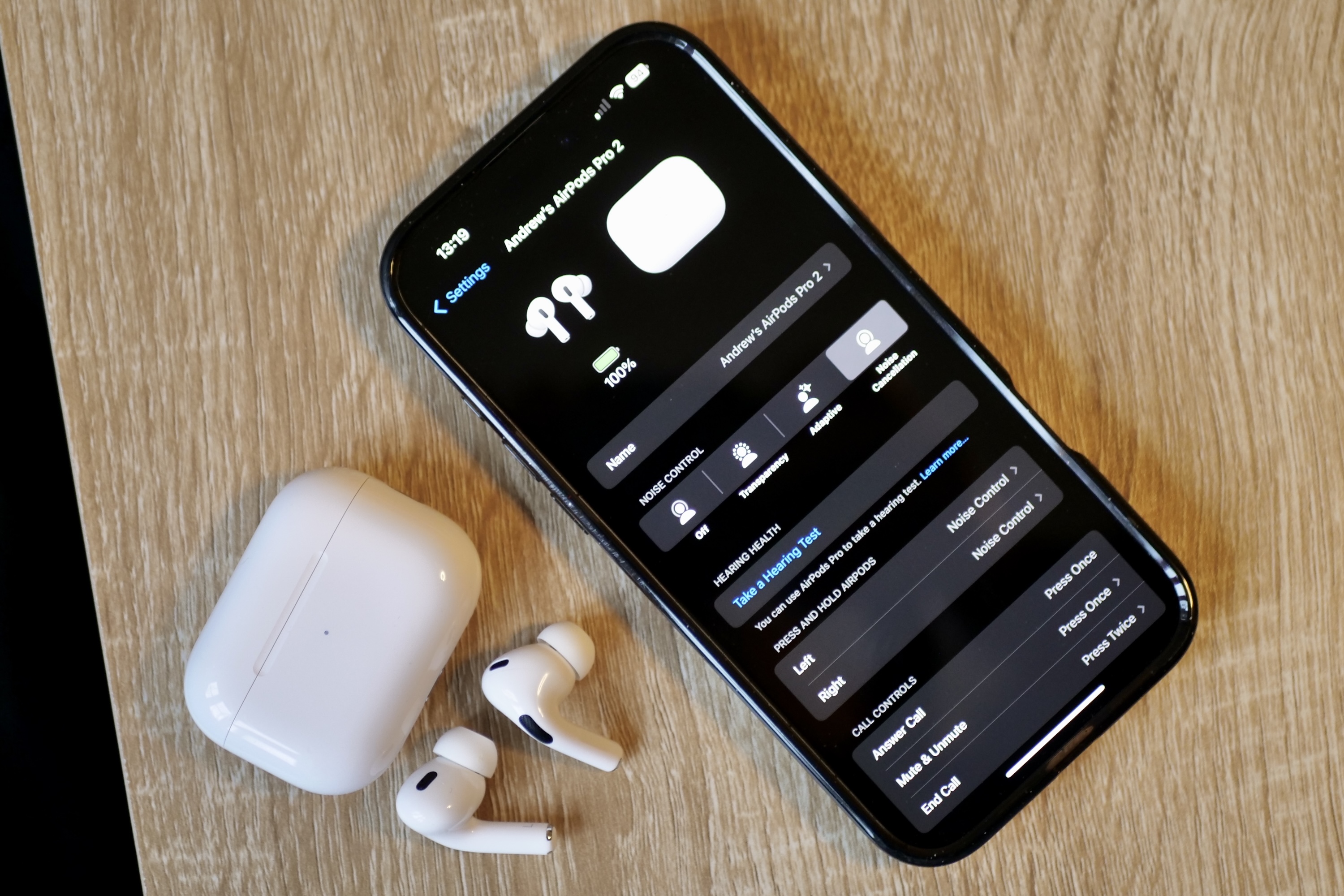 The Apple iPhone 16 Pro Max with AirPods Pro 2.