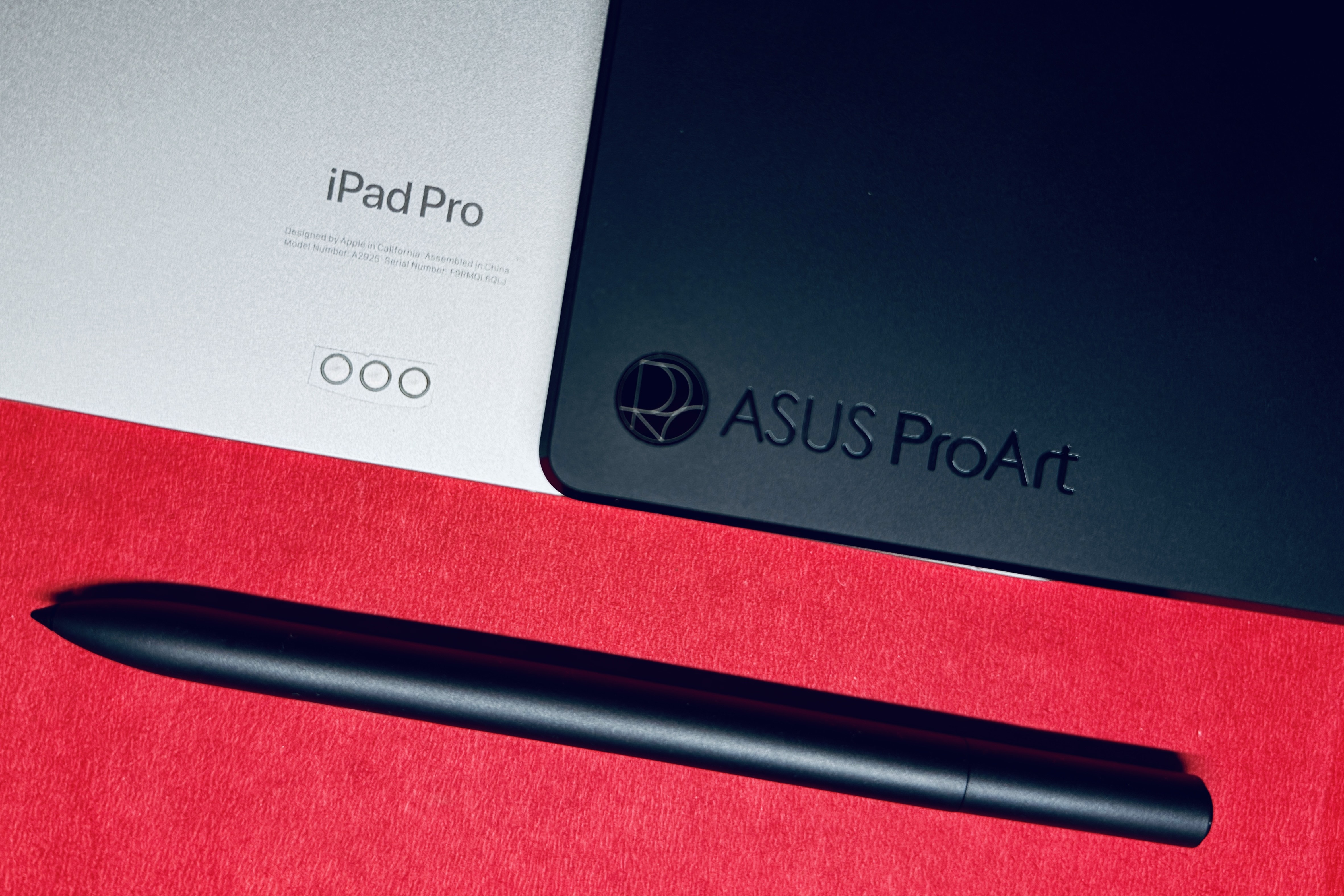 Asus ProArt PZ13 with iPad Pro and stylus.