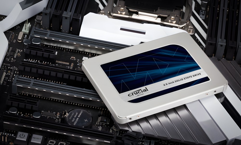 The Crucial MX500 SSD sitting on a motherboard.