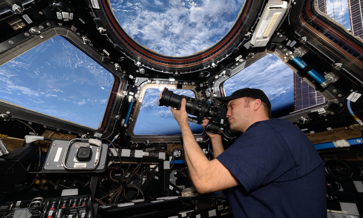 Matthew Dominick in the Cupola on space station.