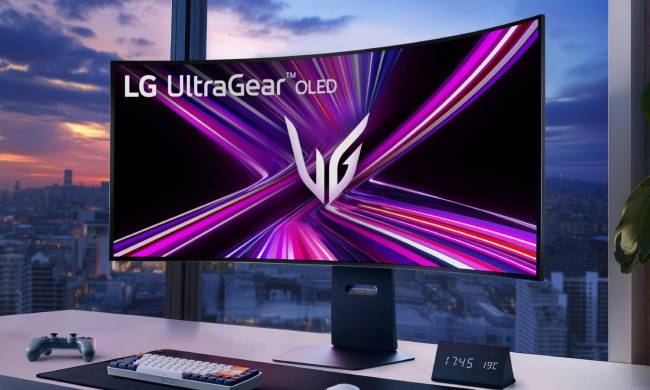 An UltraGear curved monitor on a desk in front of a window.