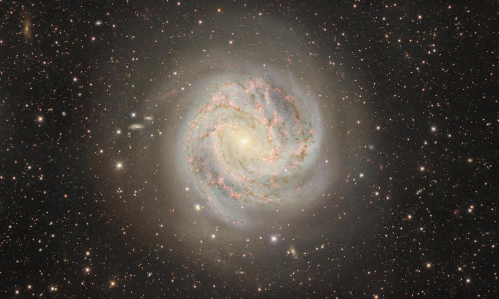 Twelve million light-years away lies the galactic masterpiece Messier 83, also known as the Southern Pinwheel Galaxy. Its swirling spiral arms display a high rate of star formation and host six detected supernovae. This image was captured with the Department of Energy-fabricated Dark Energy Camera, mounted on the U.S. National Science Foundation Víctor M. Blanco 4-meter Telescope at Cerro Tololo Inter-American Observatory in Chile, a Program of NSF NOIRLab.