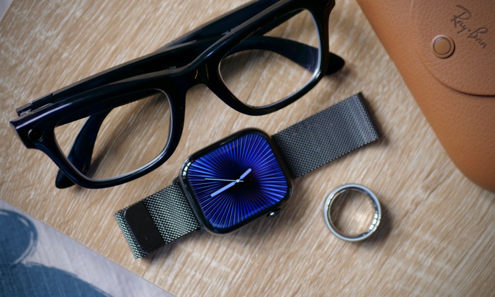 The Ray-Ban Meta smartglasses, Apple Watch Series 10, and Oura Ring 4 on a table.