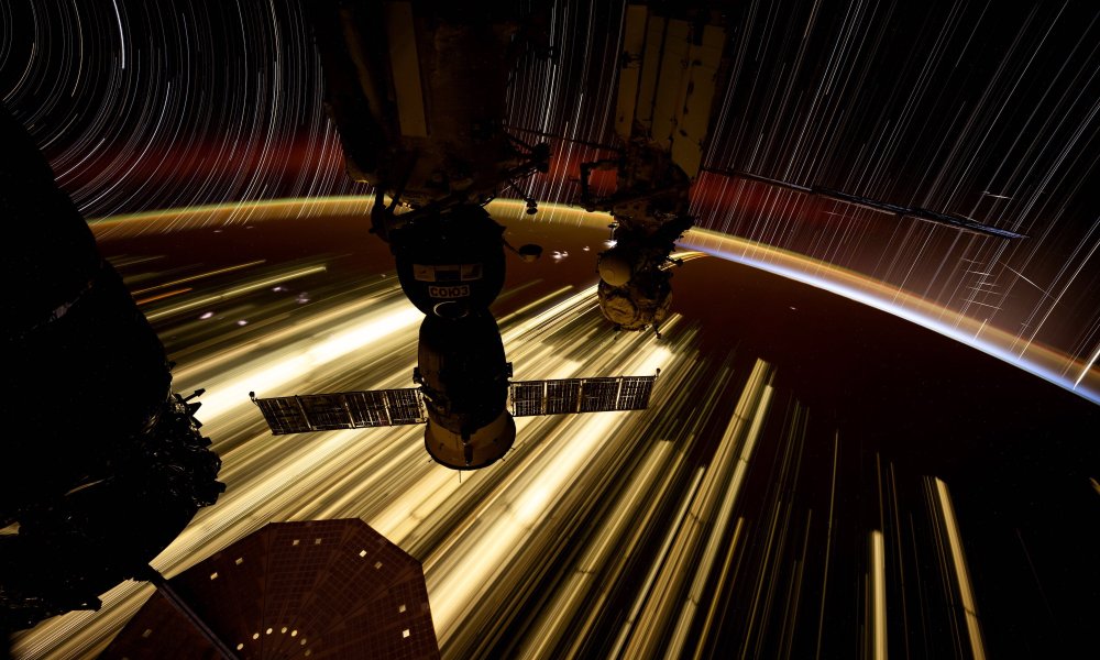 Earth, space, and the ISS as seen from the space station.