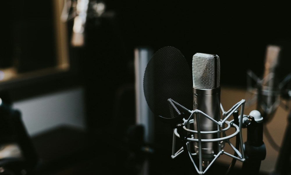 podcast mic in studio by jonathan velasquez unsplash