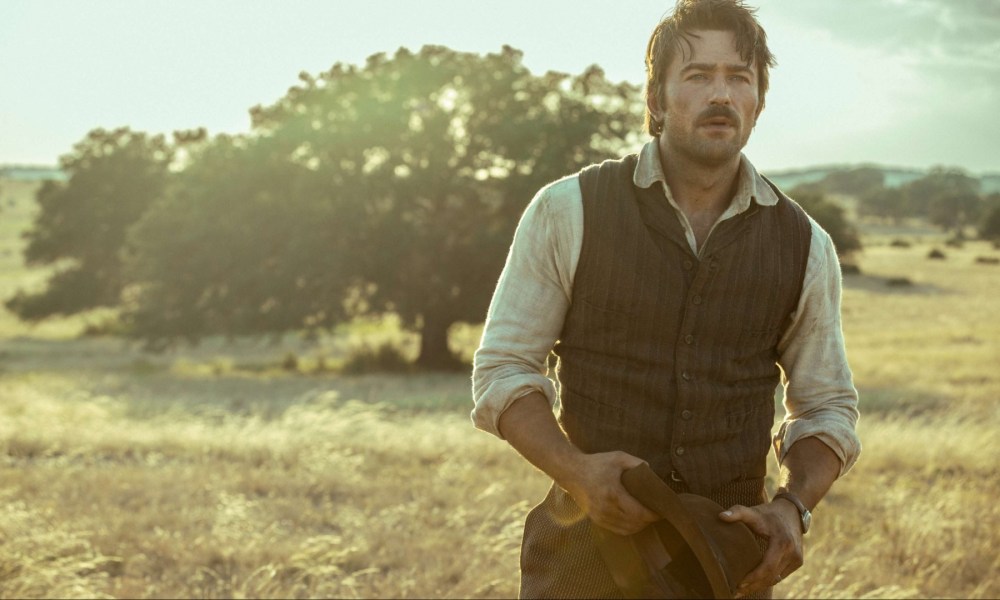 A man stands in the field in 1923 season 2.