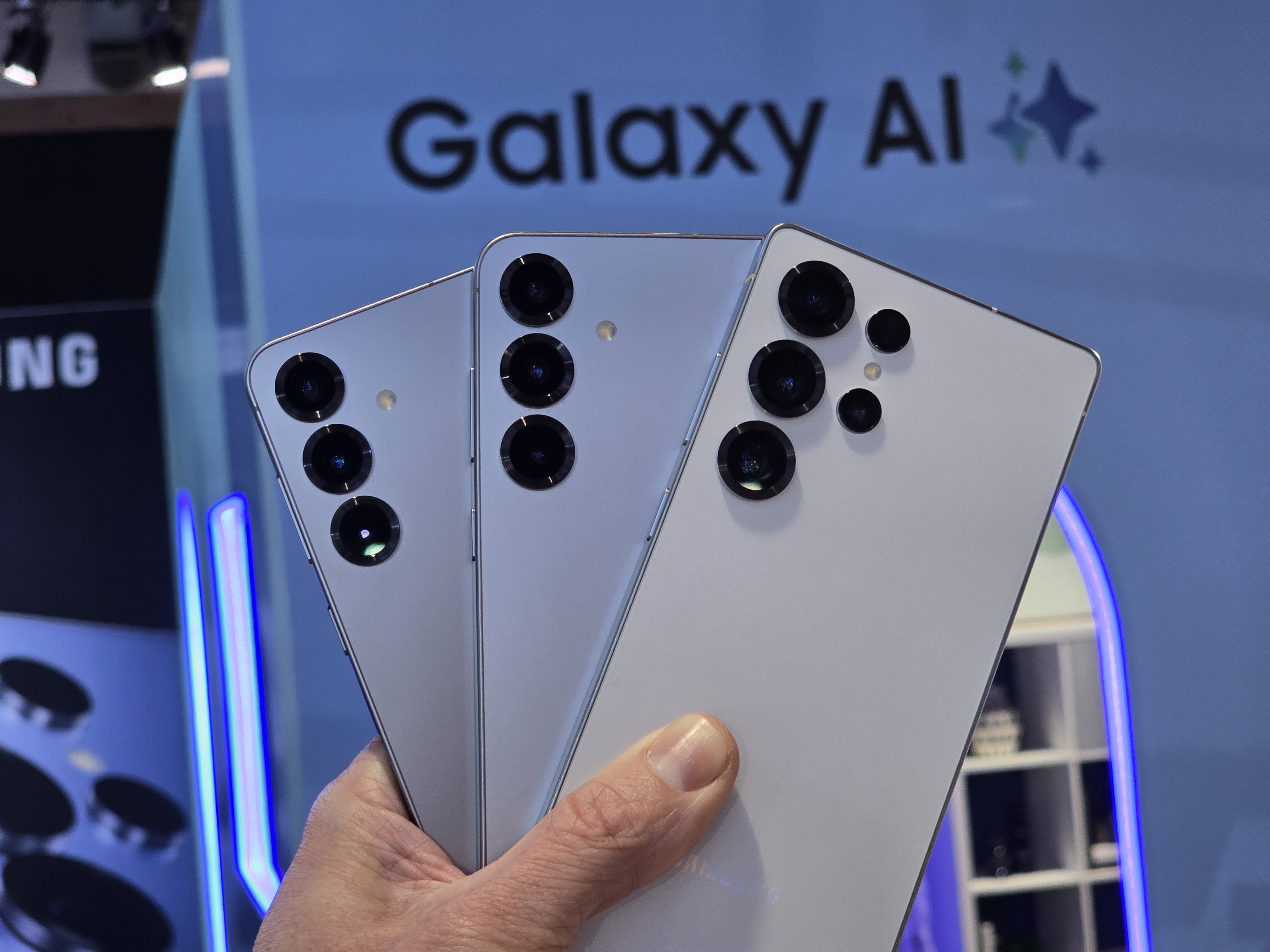 Samsung Galaxy S25 series in front of Galaxy AI sign