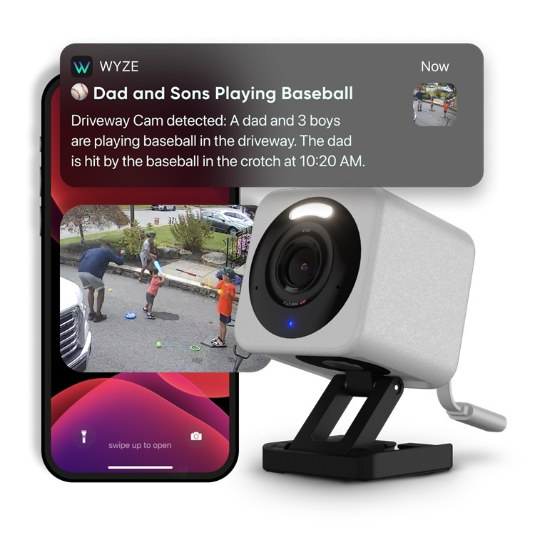 A Wyze camera next to the Wyze mobile app.