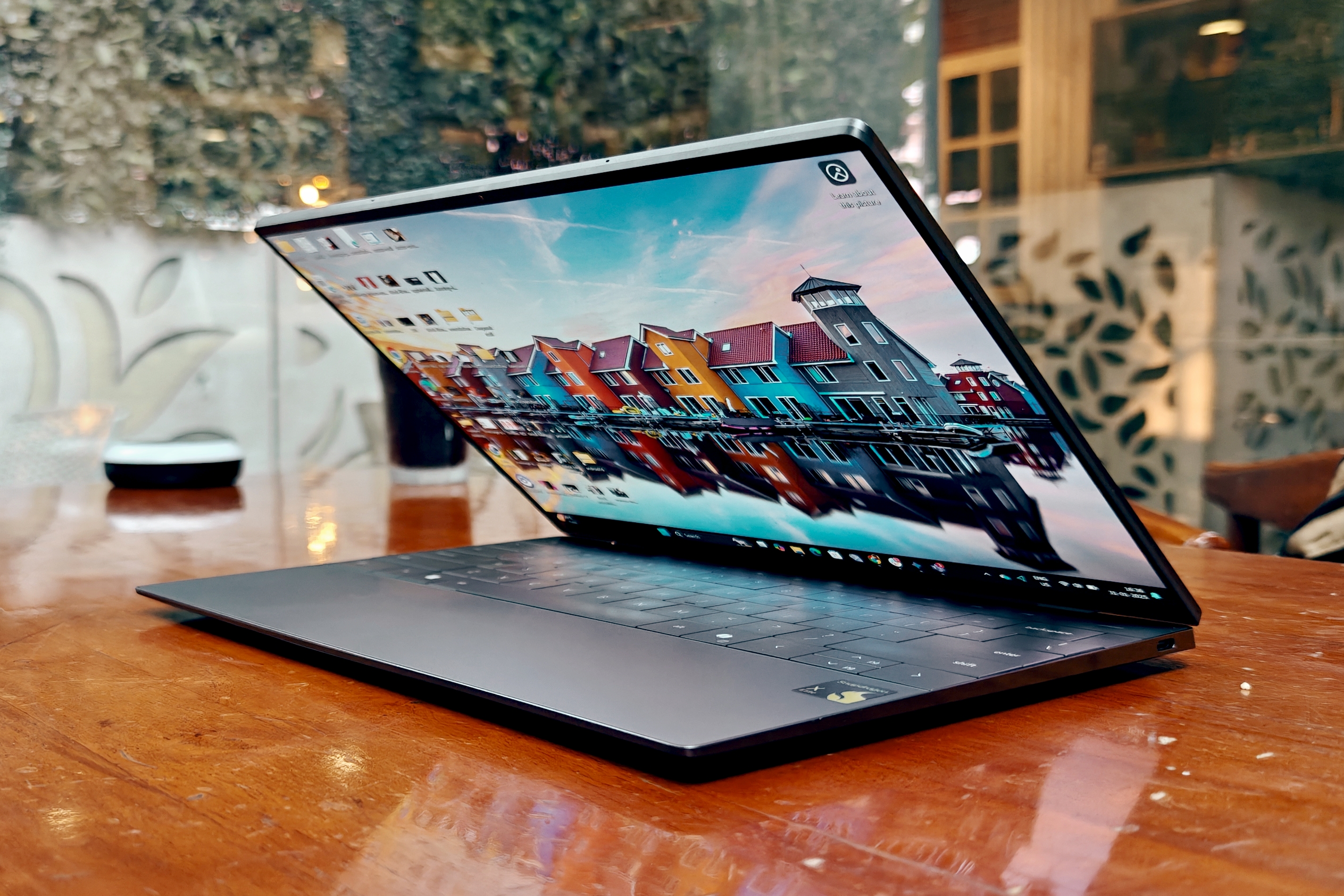 Dell XPS 13 with Snapdragon silicon atop a table.