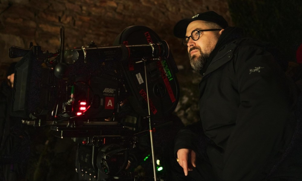 Robert Eggers sits behind a camera and stares in Nosferatu.