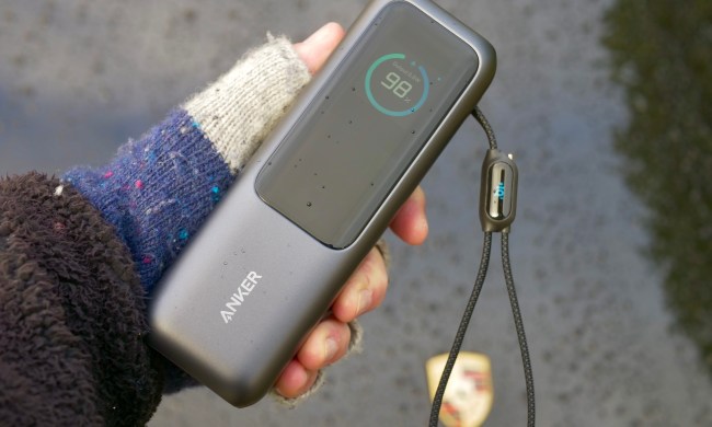 A person holding the Anker 165W Power Bank.