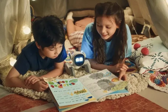 The Loona PETBOT being used by children.