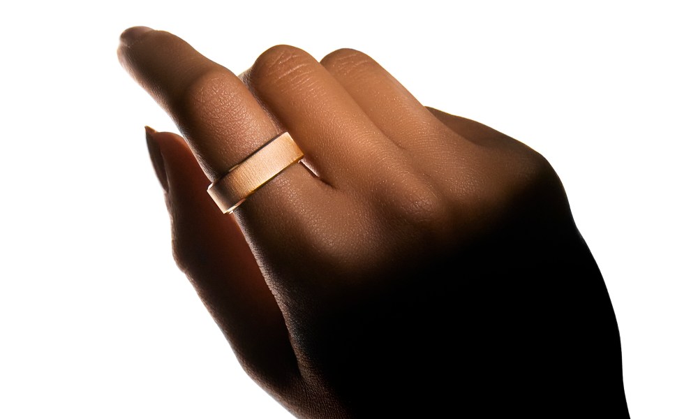 A render showing the Ultrahuman Rare smart ring on a finger.