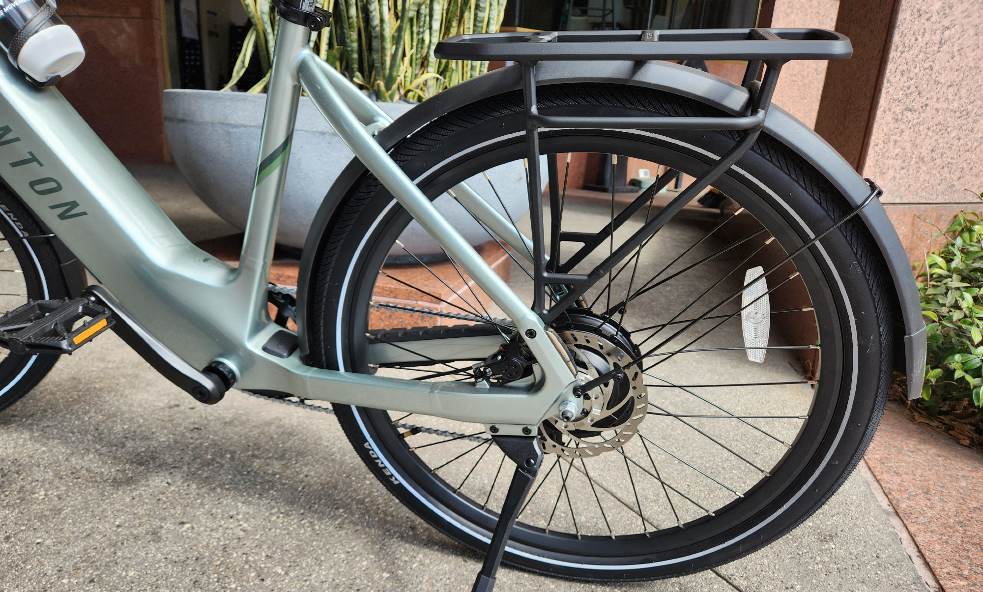 Aventon Level 3 close-up of rear wheel, rack, and ACU.