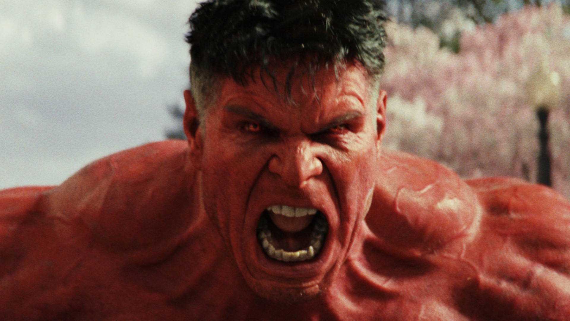 The digital likeness of Harrison Ford as the Red Hulk bellows in a still image from the movie Captain America: Brave New World.