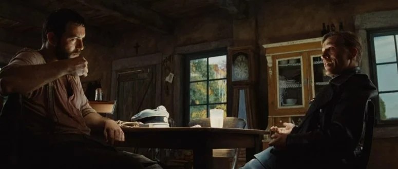 Denis Ménochet and Christoph Waltz in Inglourious Basterds.