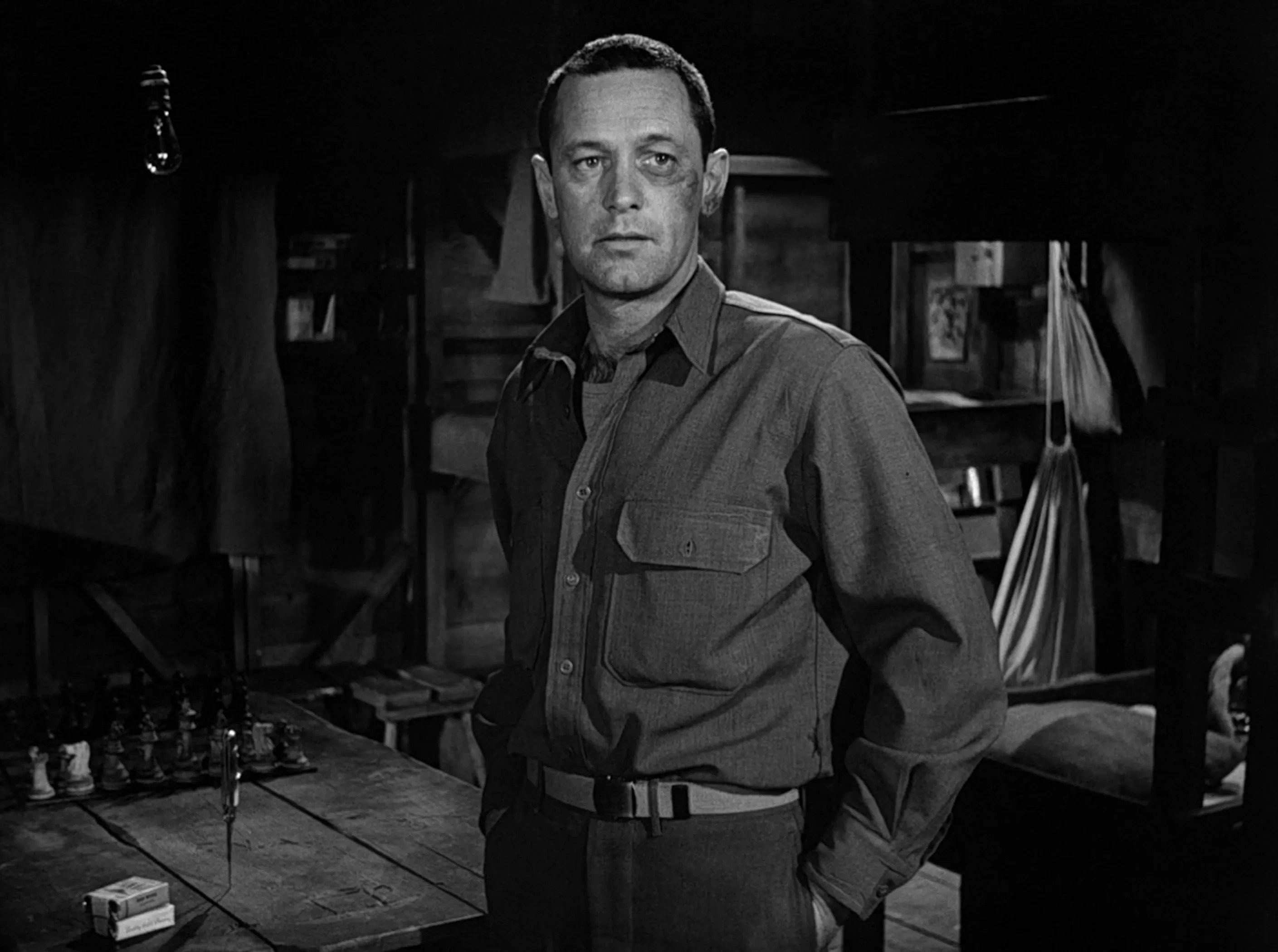 William Holden in Stalag 17.