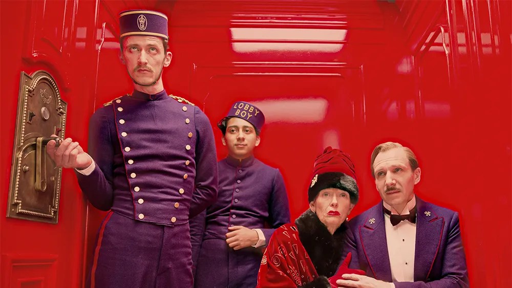 Paul Schlase, Tony Revolori, Tilda Swinton, and Ralph Fiennes in The Grand Budapest Hotel.