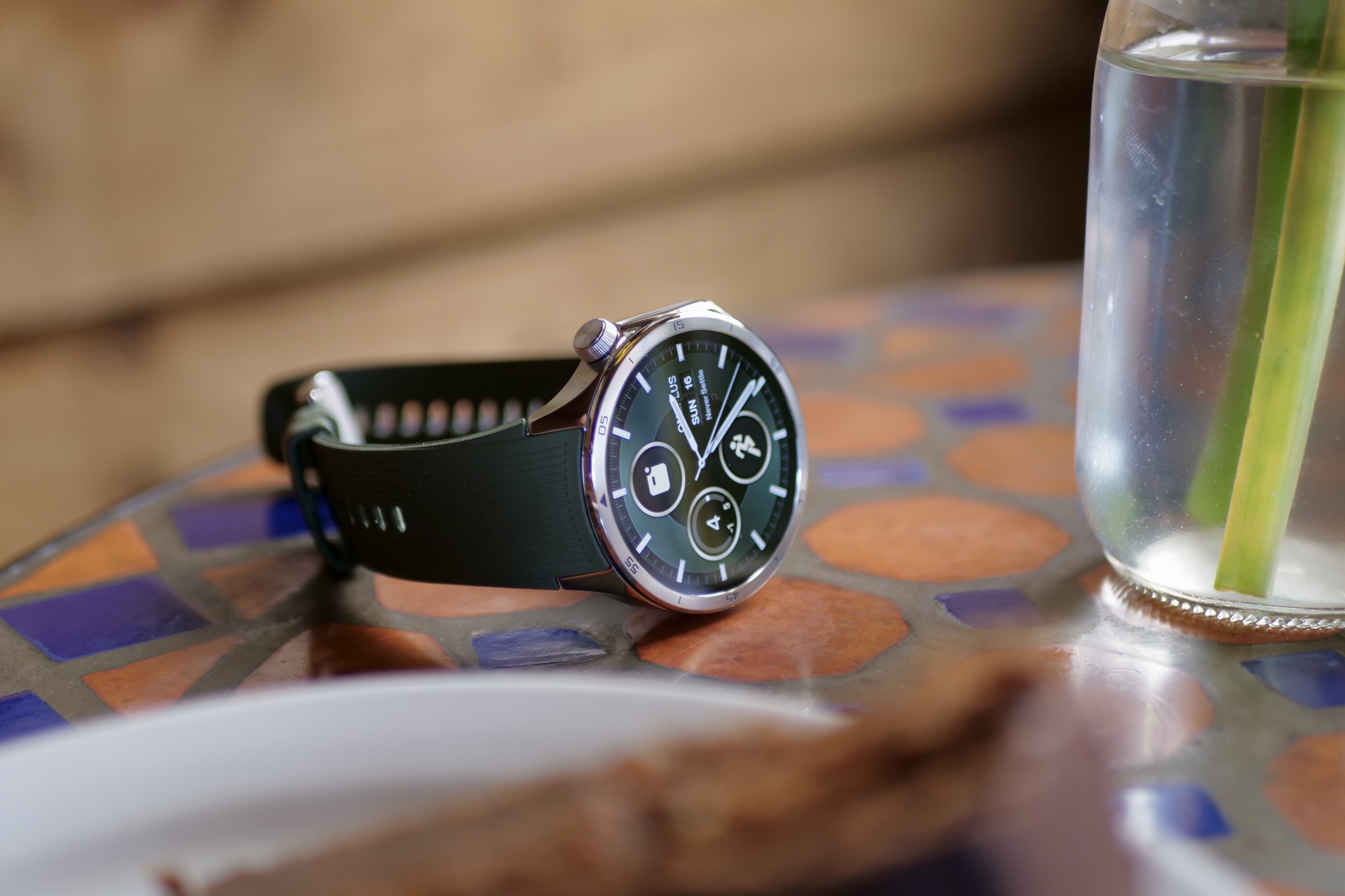 The OnePlus Watch 3 on a table.